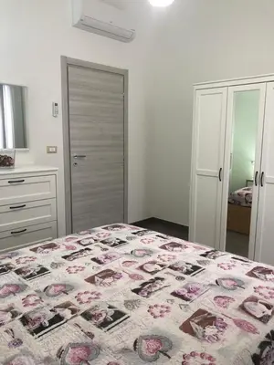 Letto o letti in una camera di LA DAMA DI AVOLA