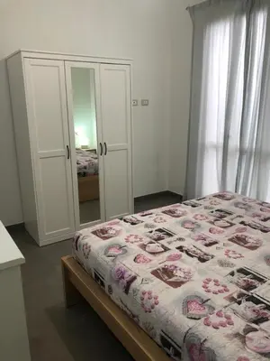 Letto o letti in una camera di LA DAMA DI AVOLA