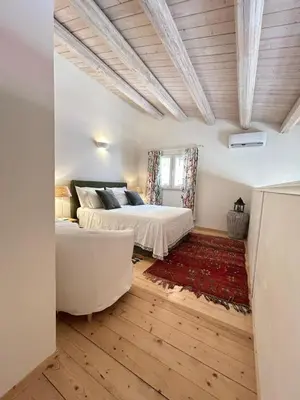 Letto o letti in una camera di AlbaRosa