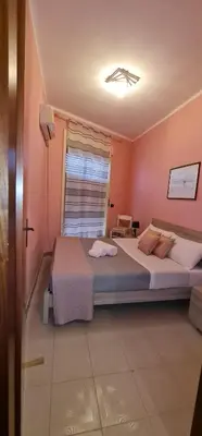 Letto o letti in una camera di Da Fenisia