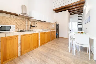 Cucina o angolo cottura di GuestHost - Ortigia and Temple of Apollo Apartments