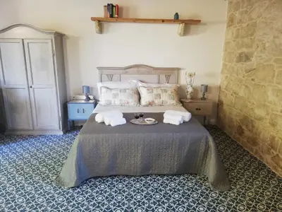 Letto o letti in una camera di Agriturismo Fondo Paliemmu