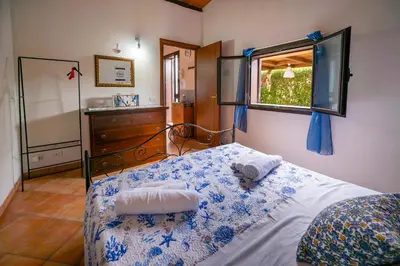 Letto o letti in una camera di Casa carmen