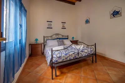Letto o letti in una camera di Casa carmen