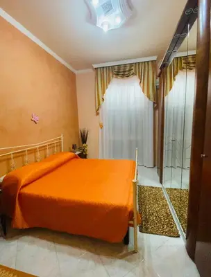 Letto o letti in una camera di Giusy's House