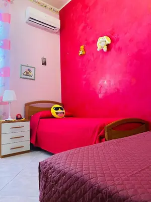 Letto o letti in una camera di Giusy's House