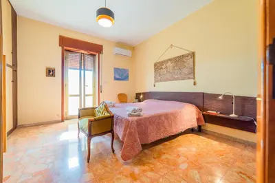 Letto o letti in una camera di GuestHost - La Terrazza di Siracusa - Roomy and Bright Flat