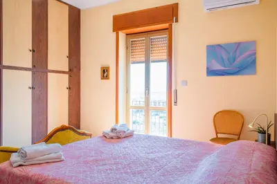 Letto o letti in una camera di GuestHost - La Terrazza di Siracusa - Roomy and Bright Flat