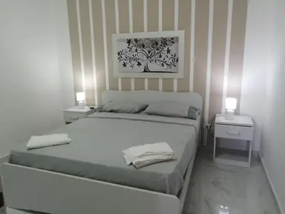 Letto o letti in una camera di Casa marzamemi