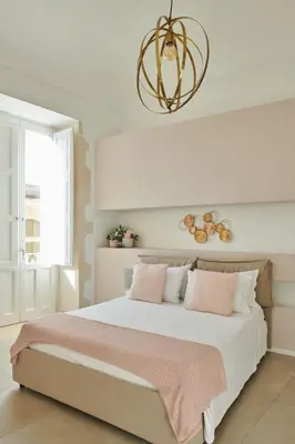 Letto o letti in una camera di CASABELLA Apartments Antico mercato Ortigia Siracusa