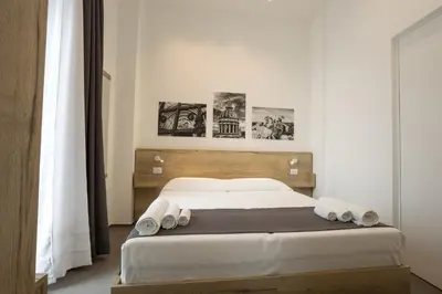 Letto o letti in una camera di Fico - Finestra Contemporanea