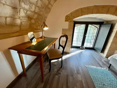 Letto o letti in una camera di Dammusu Marchesi di Sant' Elia, patrimonio UNESCO