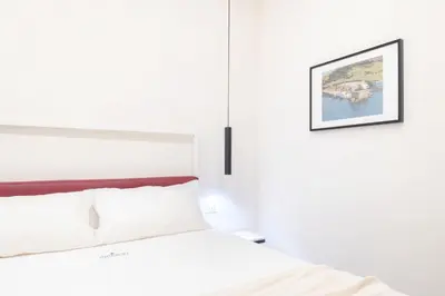 Letto o letti in una camera di MYMOON Neas