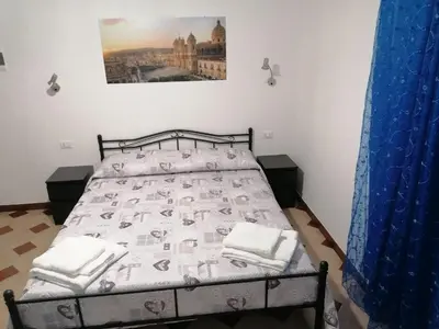 Letto o letti in una camera di Casa NILLA