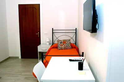 Letto o letti in una camera di B&B Ciccannina