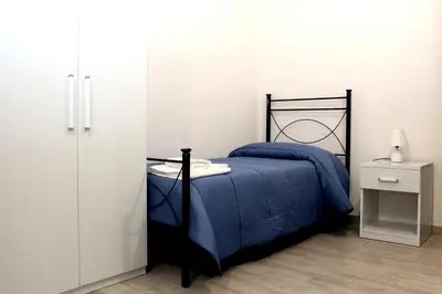 Letto o letti in una camera di B&B Ciccannina