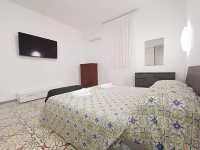 Letto o letti in una camera di Casa Ariete