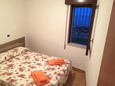 Letto o letti in una camera di Salemarino apartment