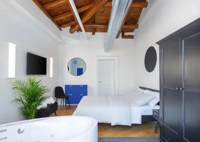 Letto o letti in una camera di The Silver Lava - design apartment and spa