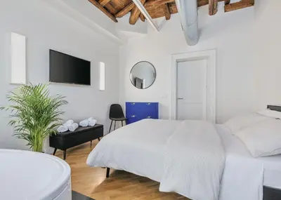 Letto o letti in una camera di The Silver Lava - design apartment and spa