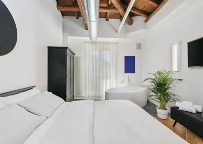 Letto o letti in una camera di The Silver Lava - design apartment and spa