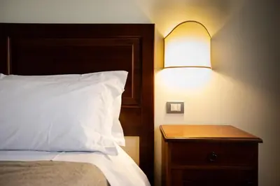 Letto o letti in una camera di Agatea a due passi dal Duomo by Wonderful Italy