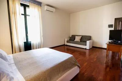 Letto o letti in una camera di Agatea a due passi dal Duomo by Wonderful Italy