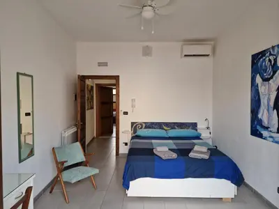 Letto o letti in una camera di SEA-VIEW TERRACE & BIKES Moon Ortigia Holiday Home
