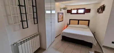 Letto o letti in una camera di SEA-VIEW TERRACE & BIKES Moon Ortigia Holiday Home