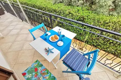 Balcone o terrazza di Loft Palm Beach - 100 metri dalla spiaggia di sabbia bianca e dal mare