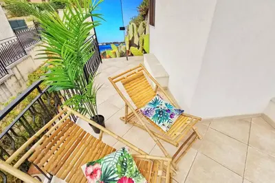Balcone o terrazza di Loft Palm Beach - 100 metri dalla spiaggia di sabbia bianca e dal mare