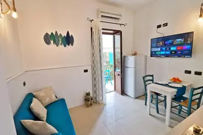TV o dispositivi per l'intrattenimento presso Loft Palm Beach - 100 metri dalla spiaggia di sabbia bianca e dal mare