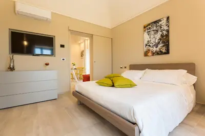 Letto o letti in una camera di Vicolo QuattroSei