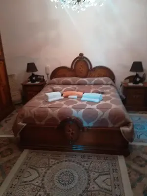 Letto o letti in una camera di RENT ROOM JOE Via Dante 77 Solarino