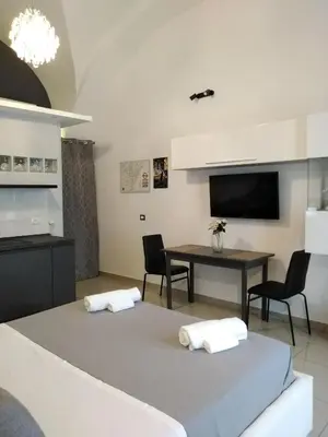 Letto o letti in una camera di Spàzio apartments Garibaldi