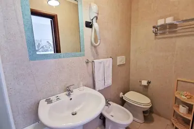 Bagno di Loft Cocorito - 100 metri dalla spiaggia di sabbia bianca e dal mare