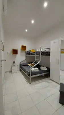 Letto o letti in una camera di IL GIRASOLE