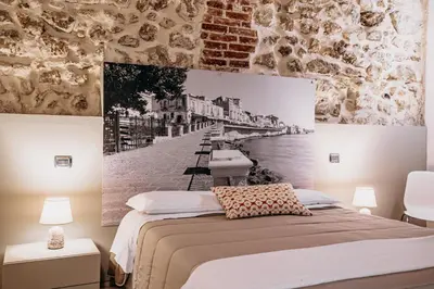 Letto o letti in una camera di B&B Vicolo IV