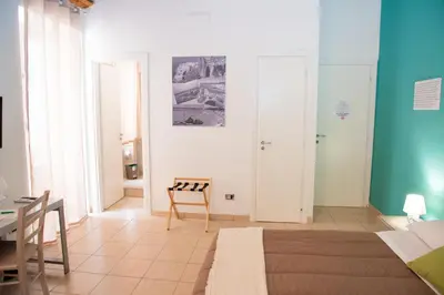Letto o letti in una camera di B&B Vicolo IV