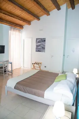Letto o letti in una camera di B&B Vicolo IV