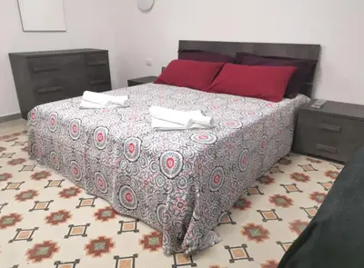 Letto o letti in una camera di Casa Ariete 2