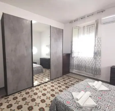 Letto o letti in una camera di Casa Ariete 2
