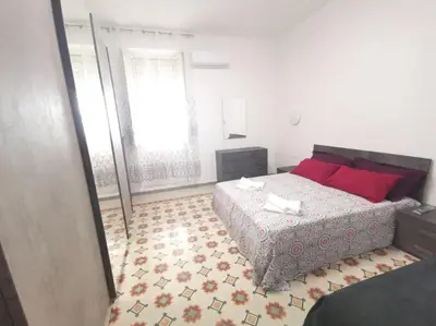Letto o letti in una camera di Casa Ariete 2