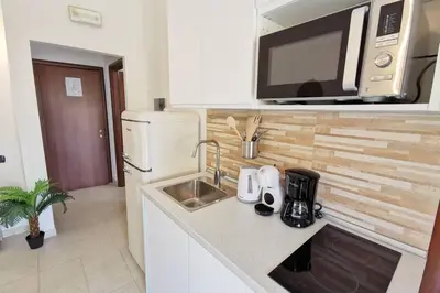 Cucina o angolo cottura di Loft Tropical - 100 metri dalla spiaggia di sabbia e dal mare