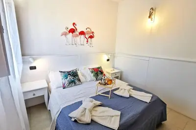 Letto o letti in una camera di Loft Tropical - 100 metri dalla spiaggia di sabbia e dal mare