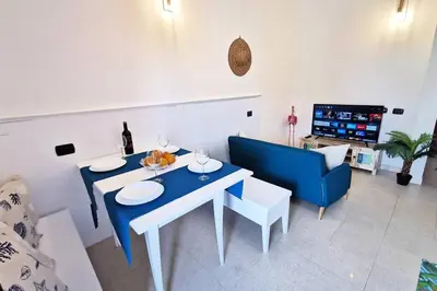 TV o dispositivi per l'intrattenimento presso Loft Tropical - 100 metri dalla spiaggia di sabbia e dal mare