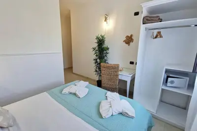 Letto o letti in una camera di Loft Tropical - 100 metri dalla spiaggia di sabbia e dal mare