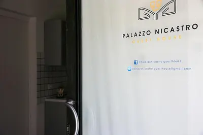 Certificato, attestato, insegna o altro documento esposto da PALAZZO NICASTRO gh - Blue House apartment