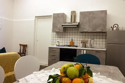 Cucina o angolo cottura di PALAZZO NICASTRO gh - Blue House apartment