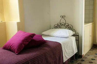 Letto o letti in una camera di PALAZZO NICASTRO gh - Red House apartment